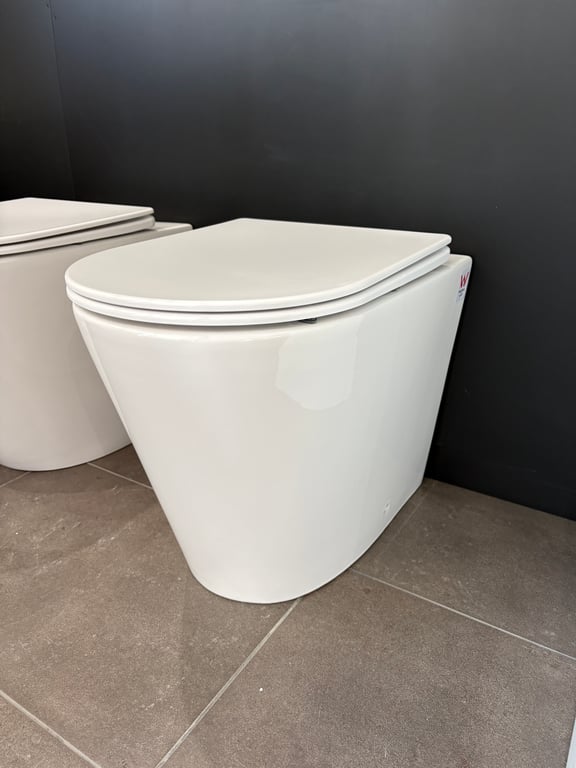 Faith Tornado style floor mount pan with Soft Close Seat. image