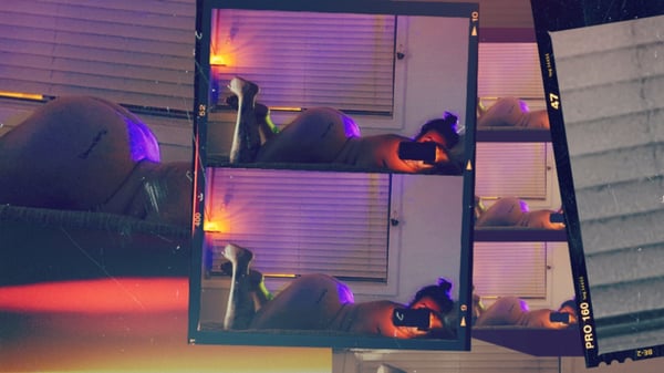 Artistic mirrored reflections of a figure in a dimly lit room with purple and orange lighting and window shades.
