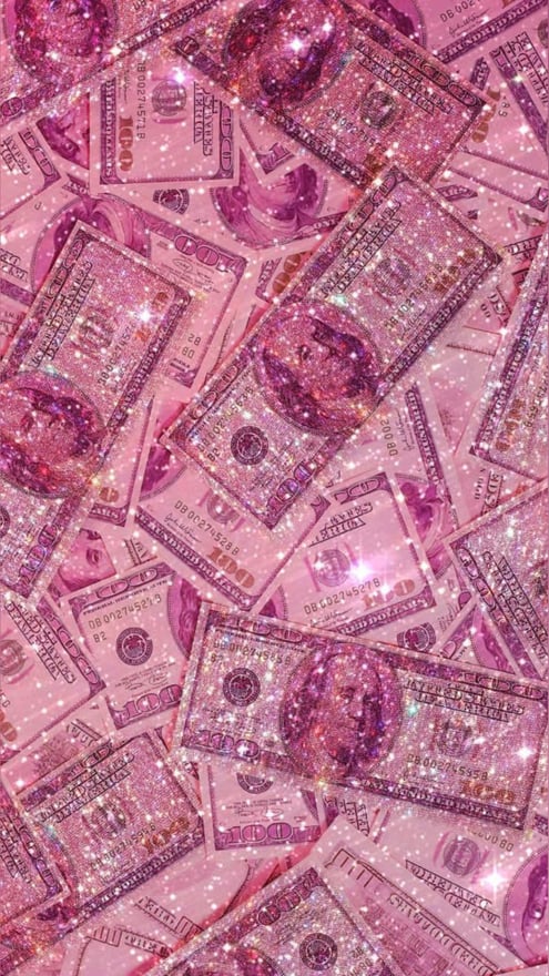 Pink-tinted collage of scattered US dollar bills with sparkling effects.