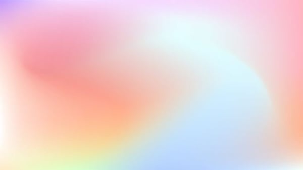 Abstract gradient background in pink, purple, orange, and blue hues with soft blurred transitions.