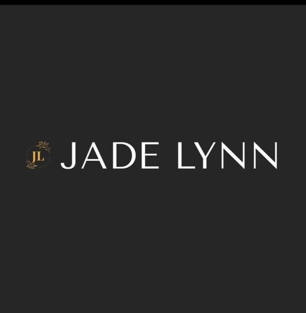 Elegant black background featuring the stylized gold text 'JADE LYNN' with decorative logo elements.