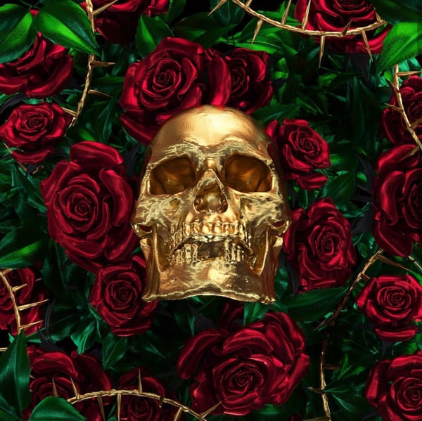 Artistic design featuring a golden skull surrounded by red roses and thorny vines on a green background.