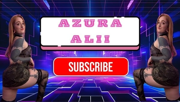 Two women with long hair and tattoos posing in dark outfits on a vibrant neon-lit background with a subscribe prompt.