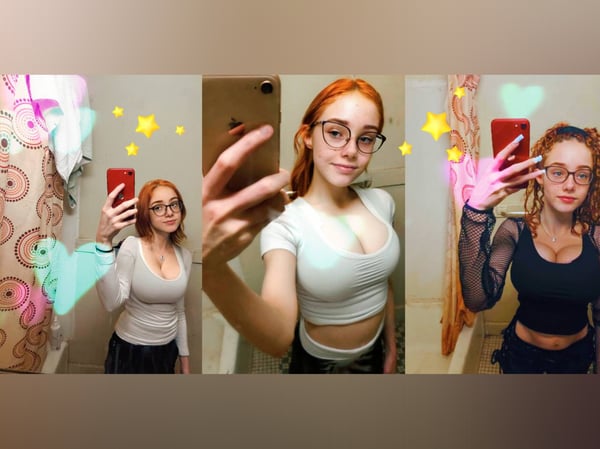 Young woman with red hair and glasses taking multiple selfies in a bathroom, wearing casual tops and posing playfully with colorful filters.
