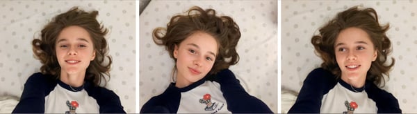 Young woman with wavy brown hair smiling playfully while lying on a bed in a casual top, shown in three close-up poses.