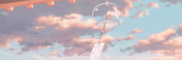 Anime-style illustration of a pink wind chime hanging from a wooden structure against a pastel sky with clouds.