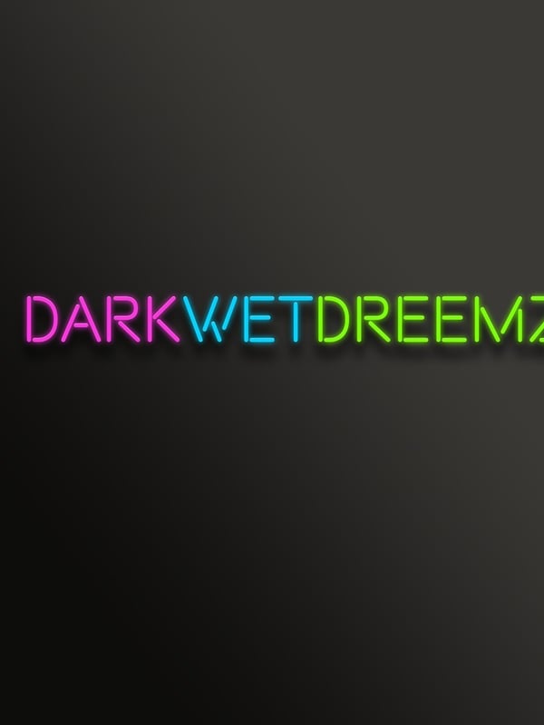 Neon-style glowing text 'DarkWetDreemz' in pink, purple, and green colors against a dark background.