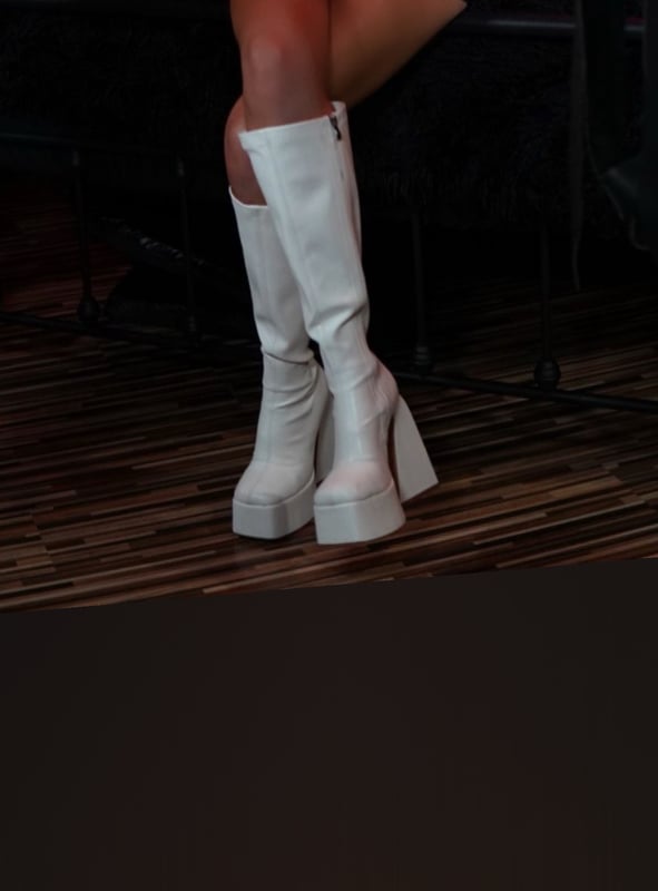 A person standing confidently in tall white platform boots against a dark indoor background.