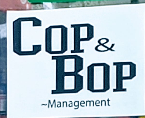 Bold black text on a white background reading 'COPY & BOB -Management' with green and colorful edges.