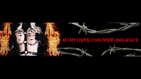Two women in dark gothic attire with restraints and dramatic fire effects against a black background.