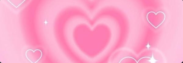 Pink gradient background with glowing hearts and sparkles in a dreamy design.