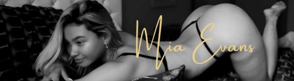 A woman with long blonde hair poses confidently on a couch in stylish lingerie, with her name elegantly scripted across the image.