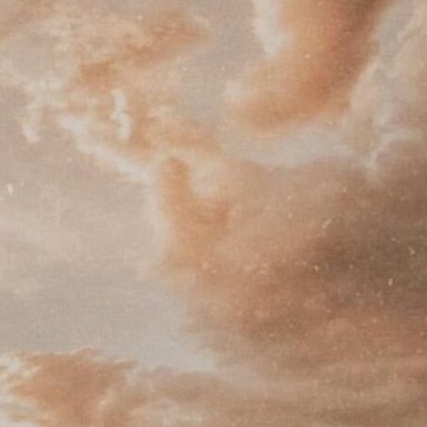 Abstract warm-toned cloudy sky in soft beige and orange hues.
