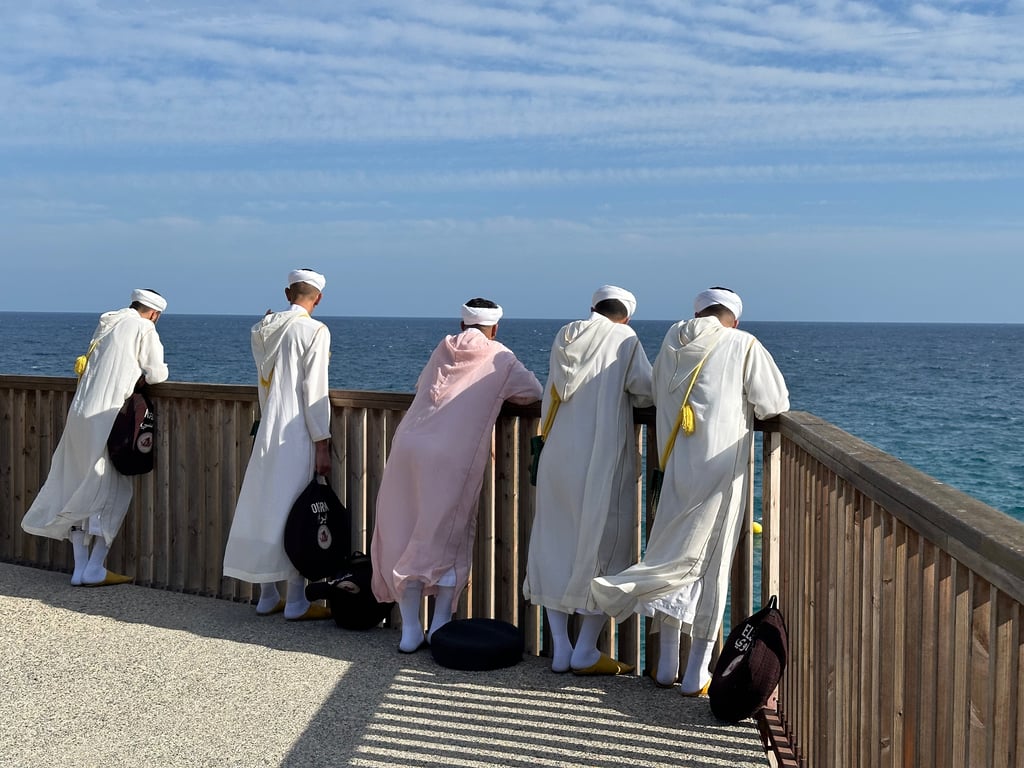 Traditional Moroccan Musicians Overlooking the Sea
