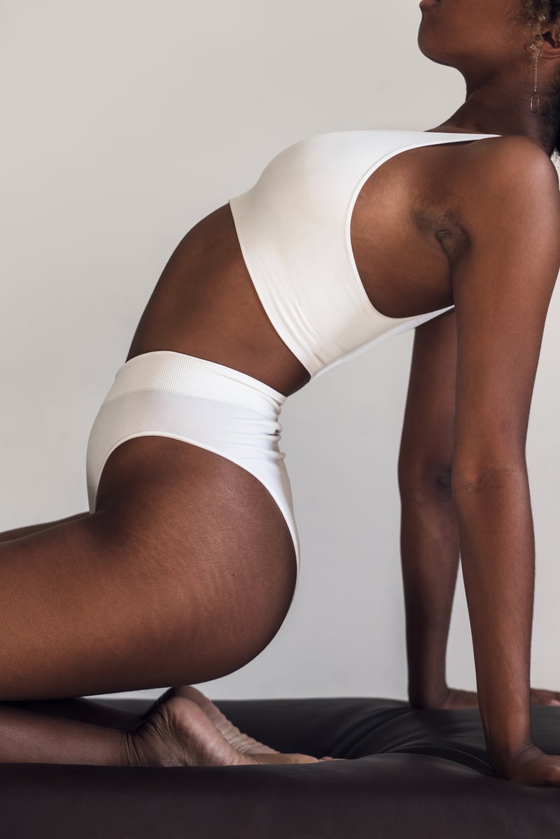 Editorial photograph of a body silhouette in soft daylight, body-surgery section