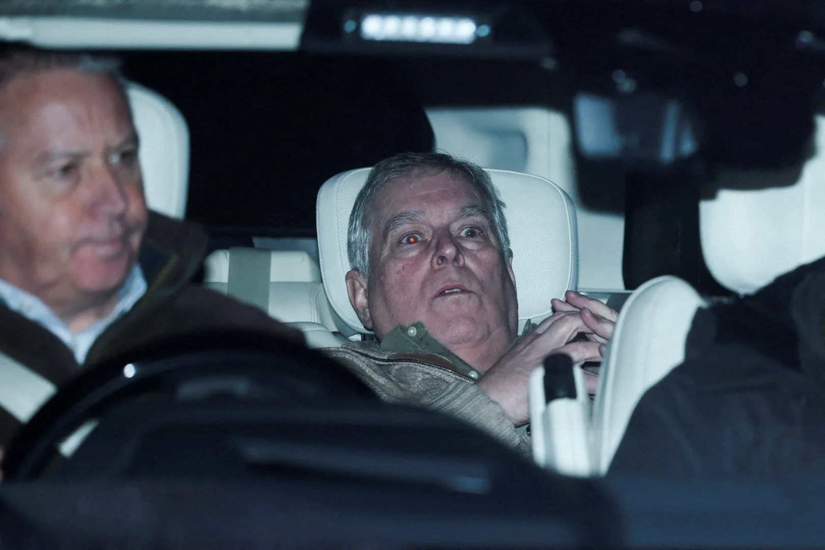 Andrew Mountbatten Windsor on a vehicle in Aylsham, Feb. 19, 2026 - Reuters