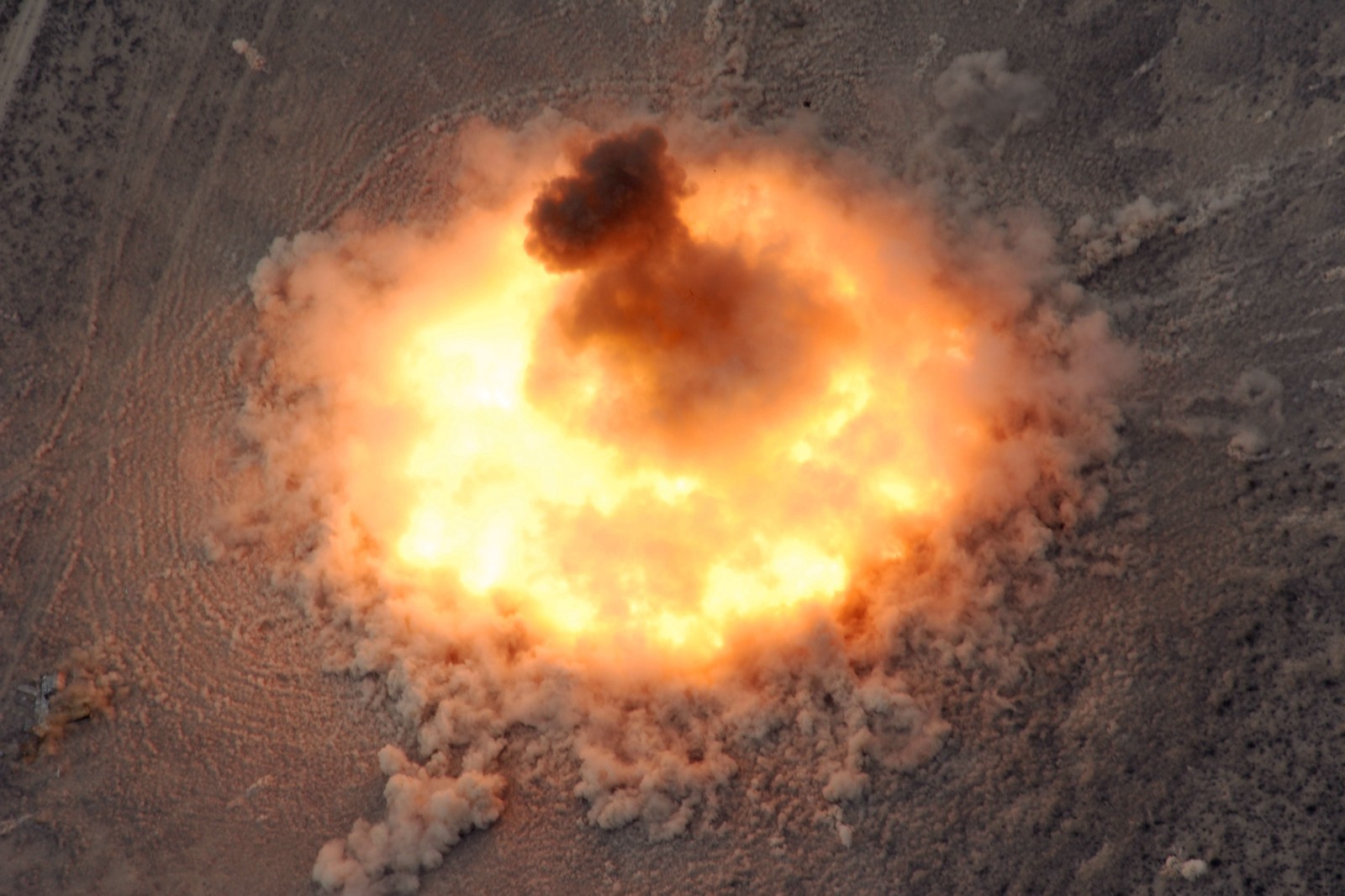 The last BLU-82 Daisy Cutter, the bomb the MOAB replaced, detonates at the Utah Test and Training Range, July 15, 2008 - U.S. Air Force photo by Capt. Patrick Nichols (public domain)
