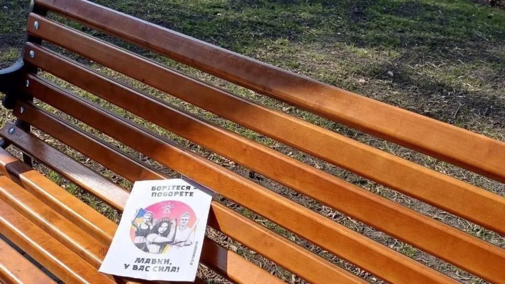 A leaflet on a park bench says the Mavka movement "has the power", quoting the famous words of national poet Taras Shevchenko: "Fight and you will overcome"