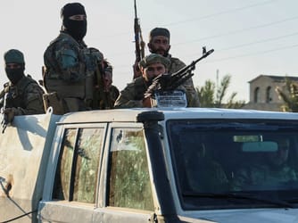 Syrian Official: Militias Commit Executions, Block Aid 