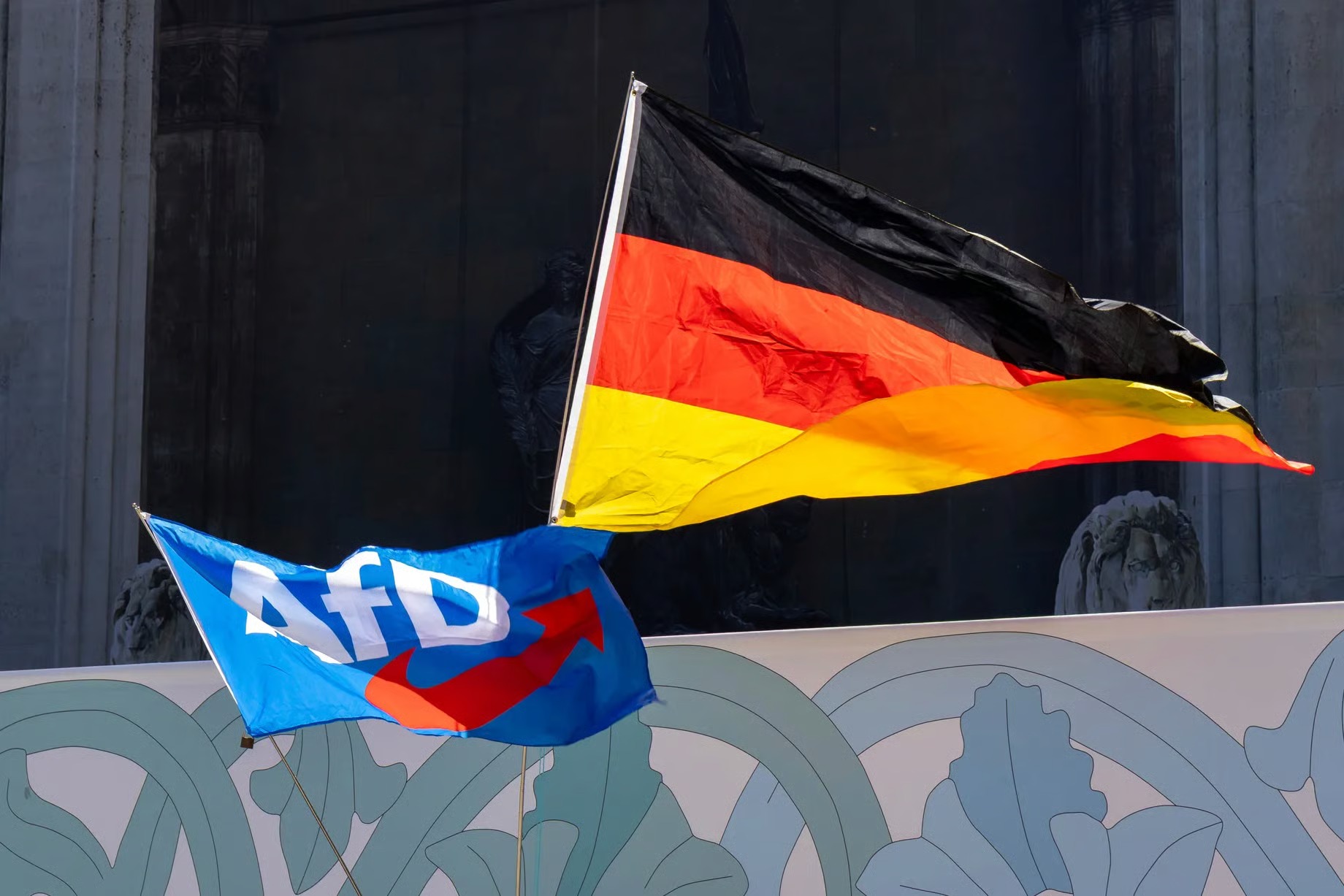 German and AfD flags in Munich, July 25, 2026 - IMAGO