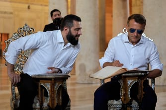 Macron Solidifies Syrian Diplomatic Ties Despite Twin Blasts