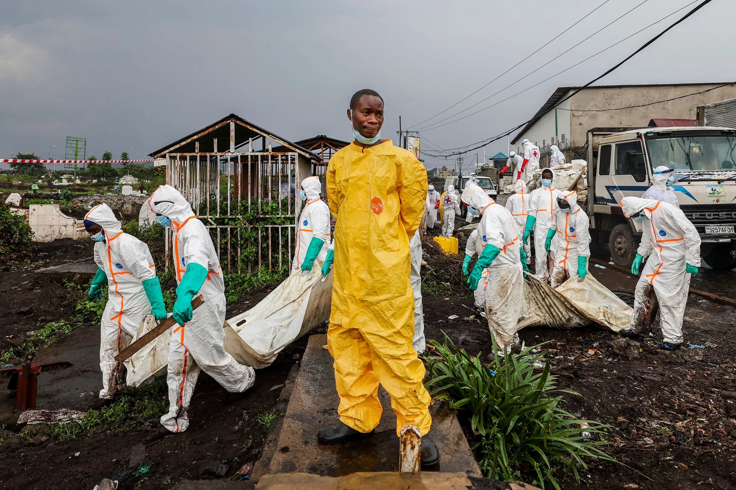 Congolese Red Cross members and volunteers carried bodies to a cemetery in Goma in February. Photo: EPA/Shutterstock
