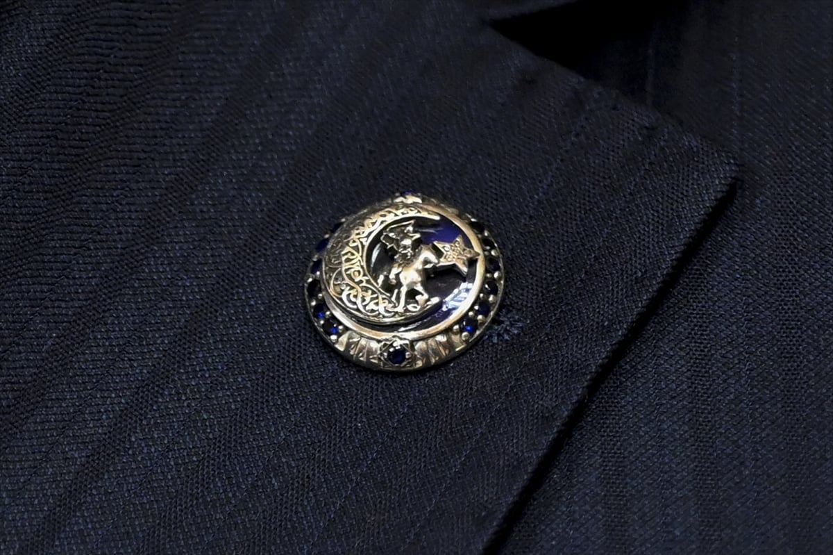 MHP Genel Başkanı Devlet Bahçeli'nin yakasına taktığı rozet dikkat çekti.