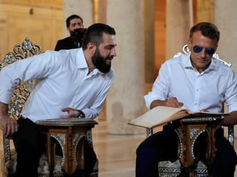 Macron Solidifies Syrian Diplomatic Ties Despite Twin Blasts