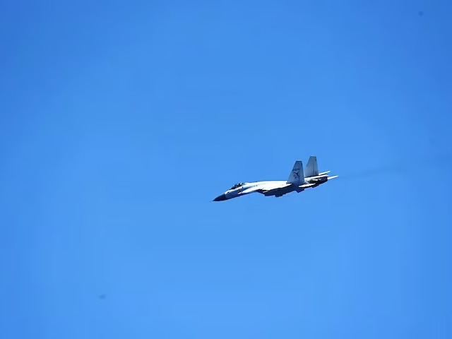 Chinese Jets Shadow Japanese Patrol Planes