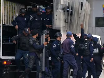 US Detainees Released, Political Prisoner Debate Flares