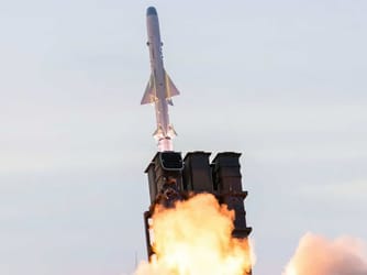 Japan Approves Record Defense Budget to Deter China