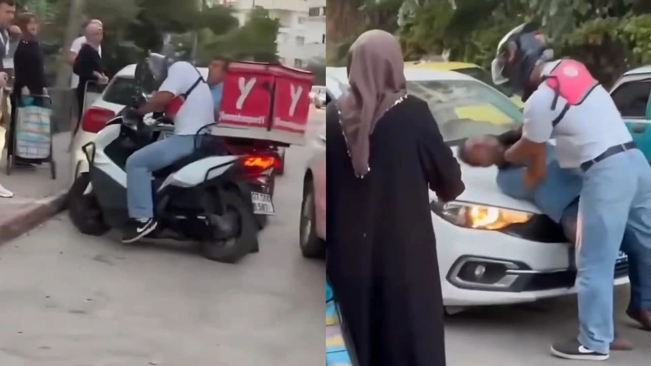 Otomobil sürücüsü ile motokurye arasında çıkan kavga kameraya yansıdı
