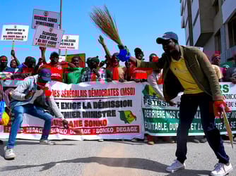 Unions Protest Layoffs & Debt as Senegal Debt Crisis Deepens