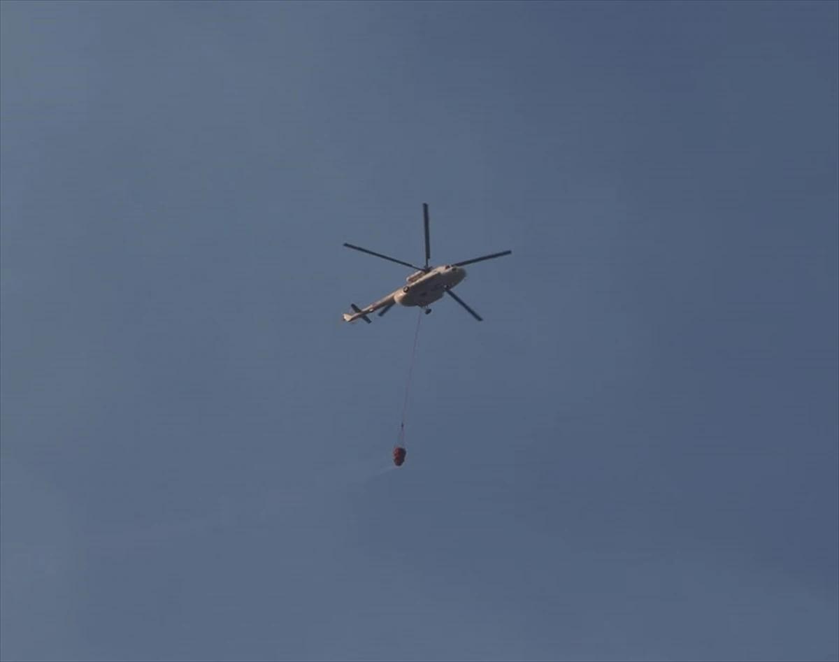 Kaş'ta orman yangını 2. gününde: Sarp arazide havadan ve karadan zorlu mücadele