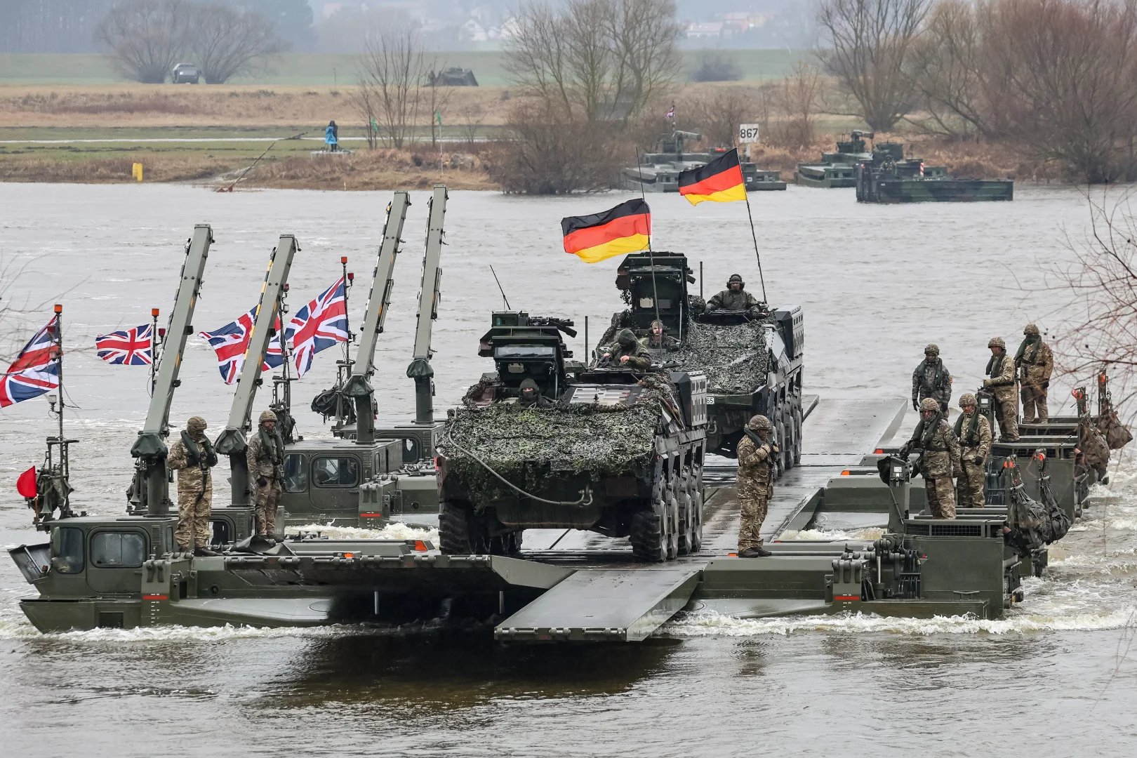 German and British troops transfering armored vehicles via Vistula river, March 5, 2024 - Getty Images