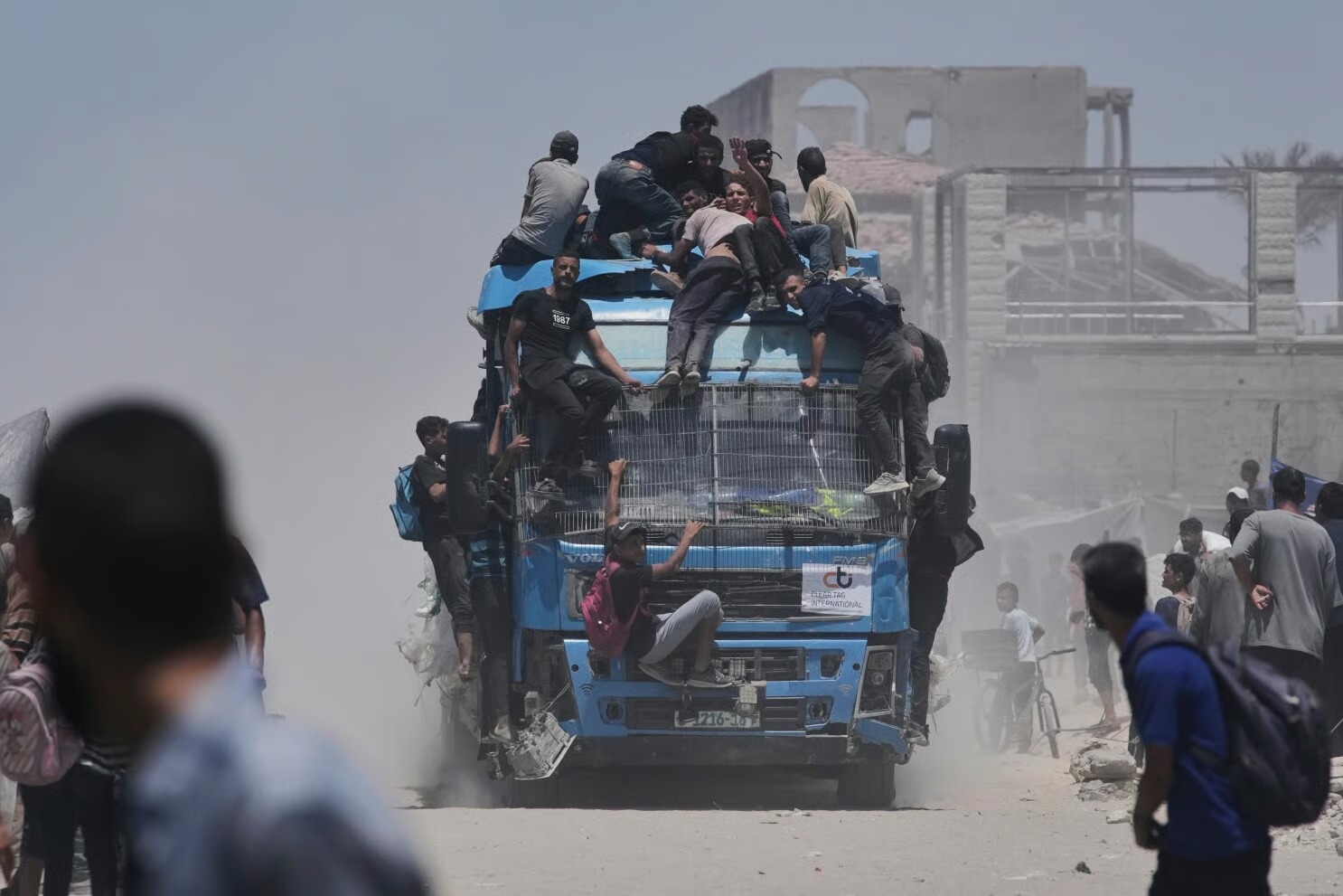 Satellite Images Reveal Gazans Swarming Aid Trucks 