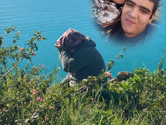 Antalya'da otizmli oğlundan ayrılmak istemeyen annenin yürek burkan falez eylemi