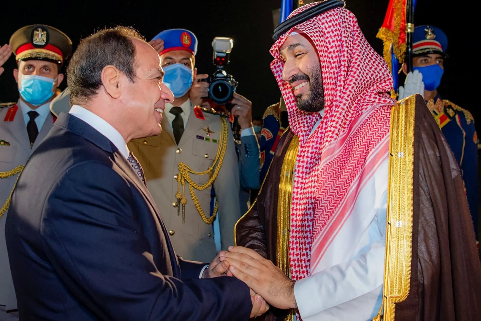 Egyptian President Abdel Fattah el-Sisi welcomes Saudi Crown Prince Mohammed bin Salman upon his arrival in Cairo -Reuters