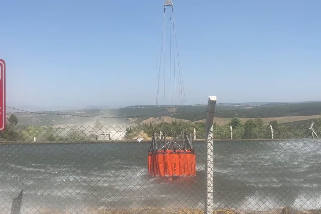 İtfaiye eri gönüllü vatandaş kadın çocuk yangına karşı tek yürek