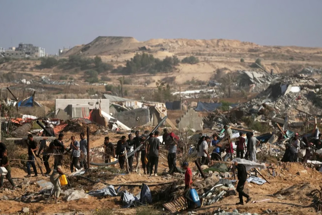 Israeli Fire Kills 27 Palestinians at Gaza Aid Site