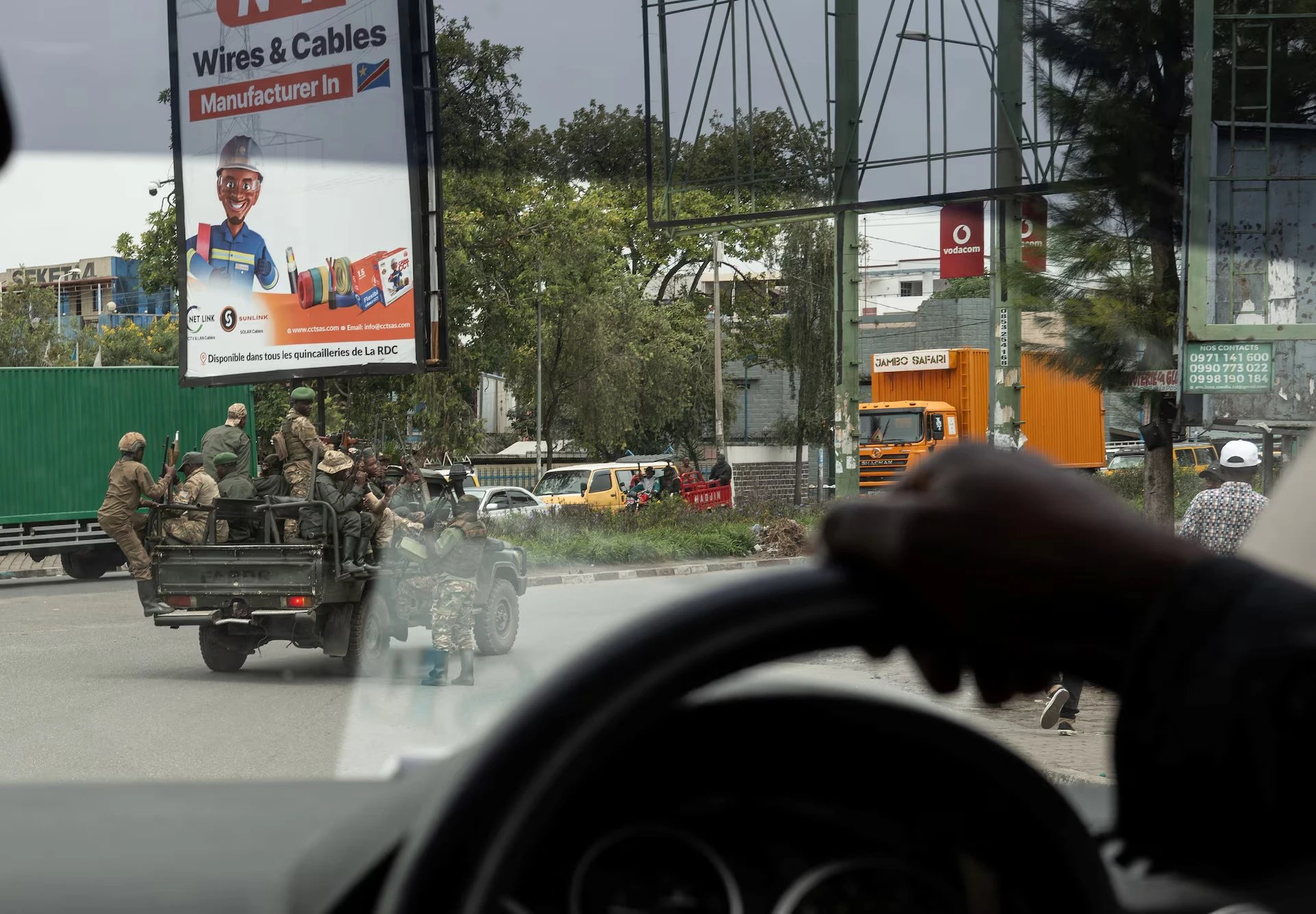 M23 insurgents viewed through a car's windshield in Goma, Democratic Republic of Congo, on March 20, 2025. The rebels seized control of the city early this year in a lightning advance. REUTERS/Zohra Bensemra