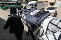 Filistinli gazeteci toprağa verildi.