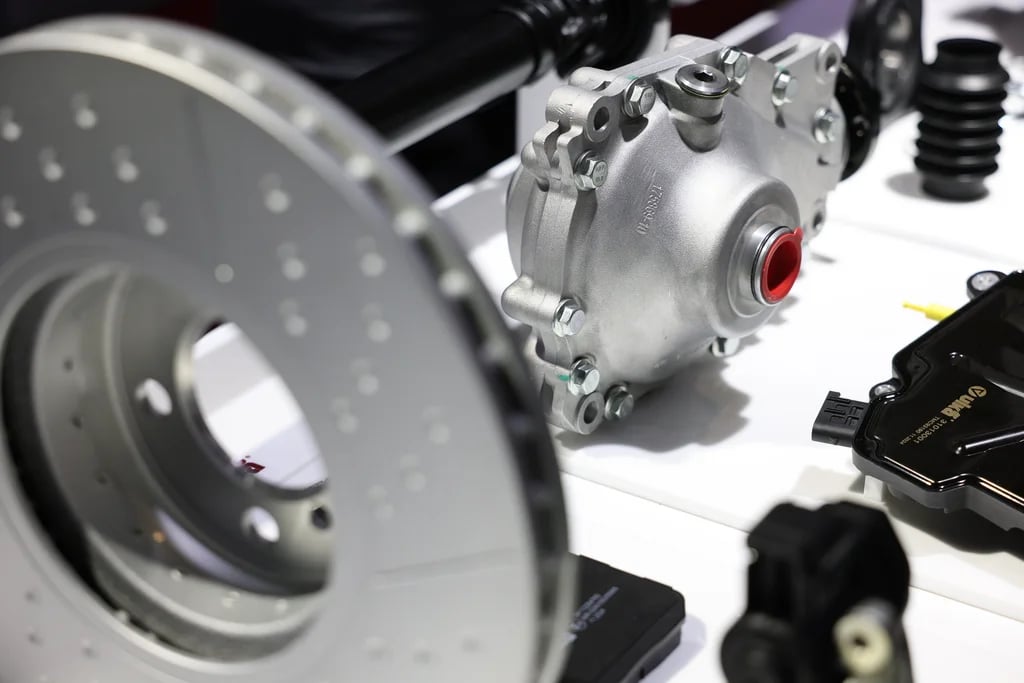 Autonomous mobile robots and robotic arms for automotive warehouse logistics