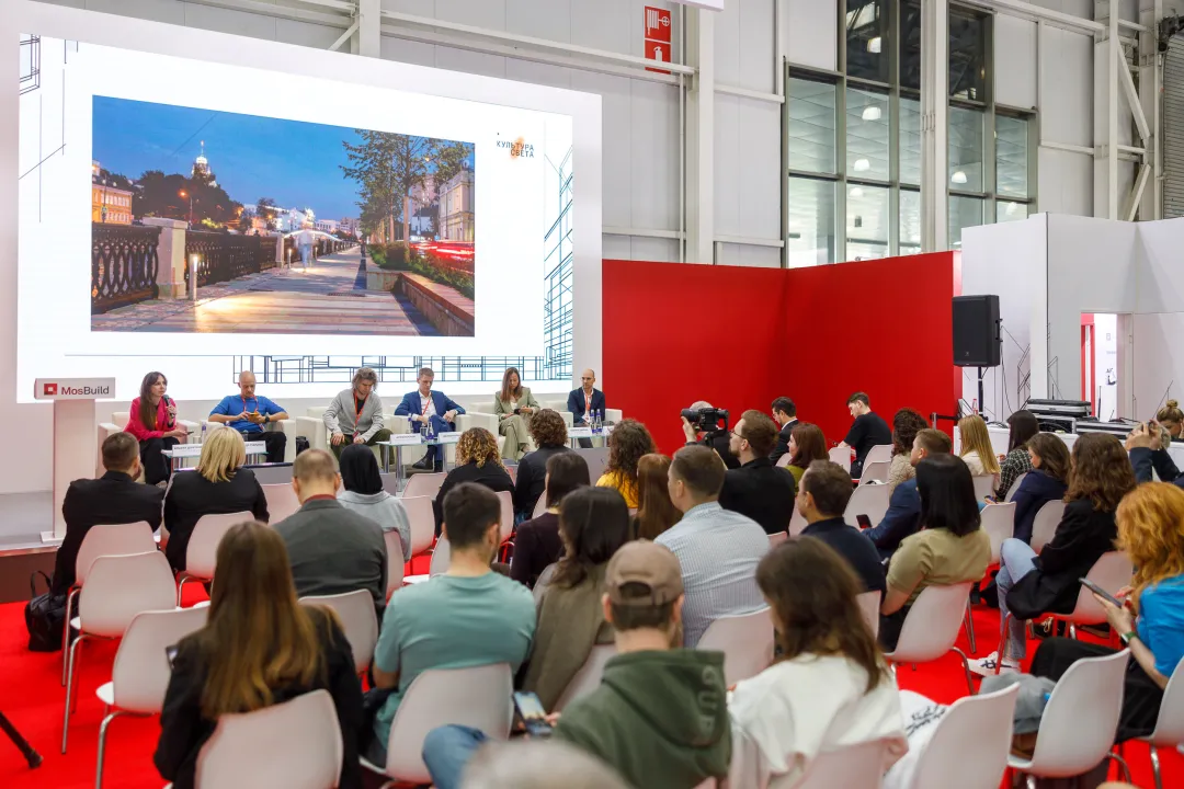 Business networking and industry discussion at a building materials summit