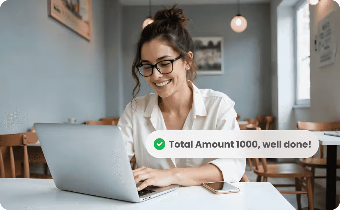 Professional reviewing a financial reconciliation workflow on a laptop