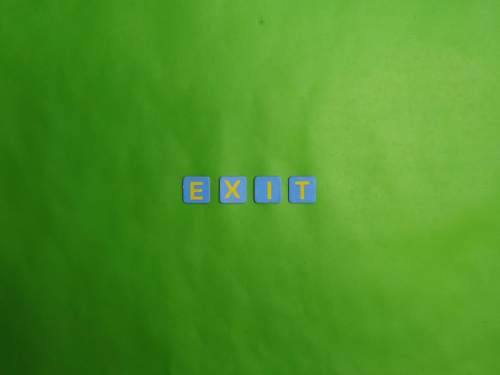 Minimalist photo of 'EXIT' spelled in blue tiles on a vibrant green background.