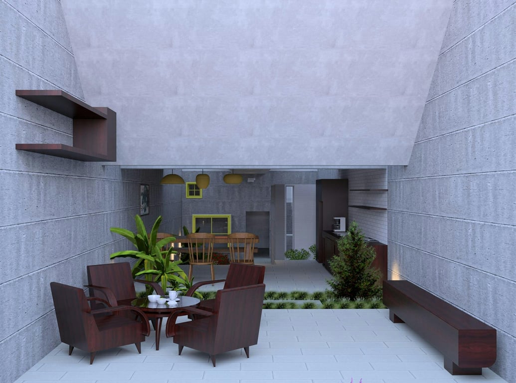 A modern minimalist indoor patio featuring stylish furniture and greenery.