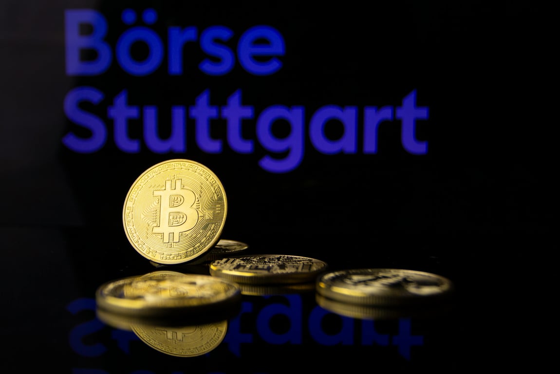 Image of Bitcoin coins with Börse Stuttgart sign, representing cryptocurrency trading.