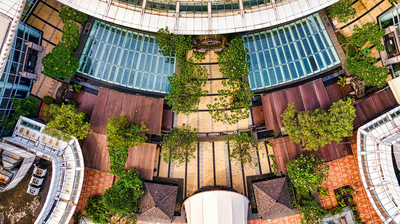 Aerial view of a modern building surrounded by greenery in Banten, Indonesia.