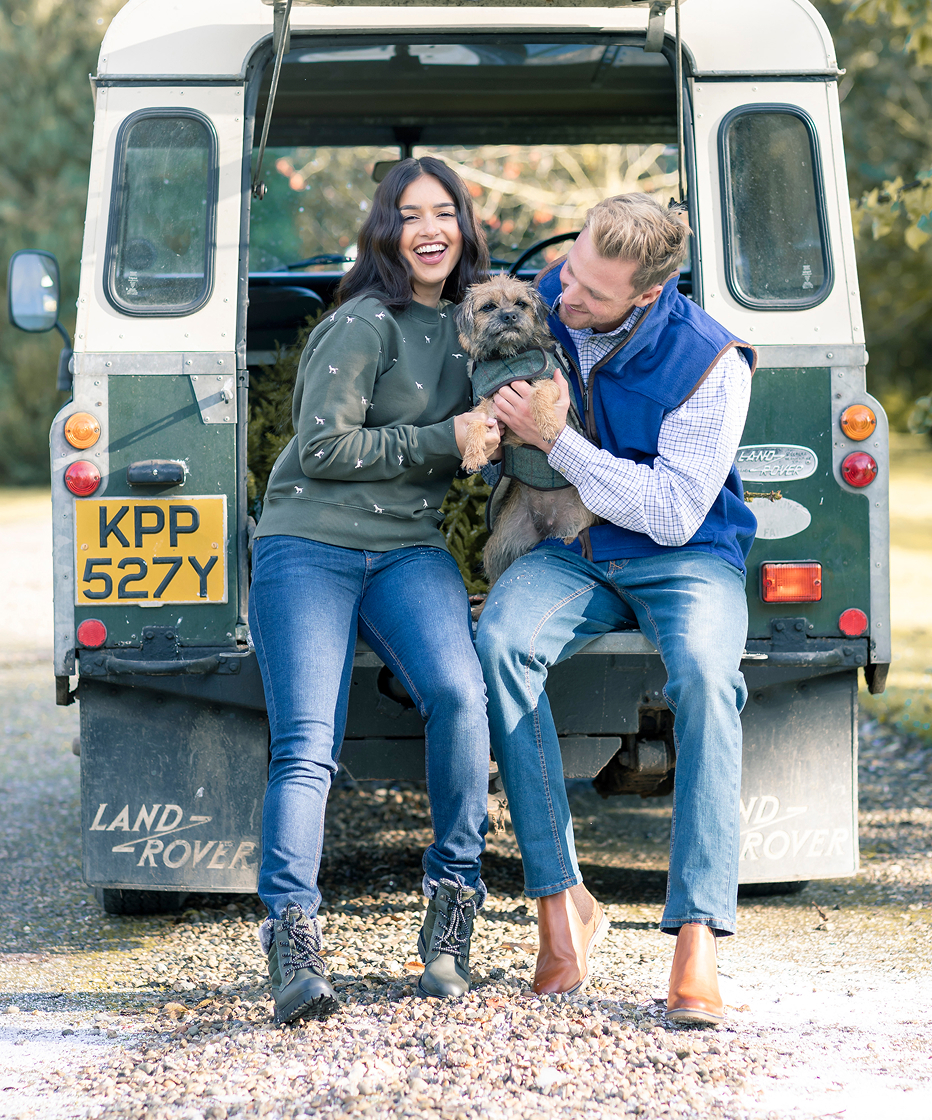 Happy couple with Land Rover